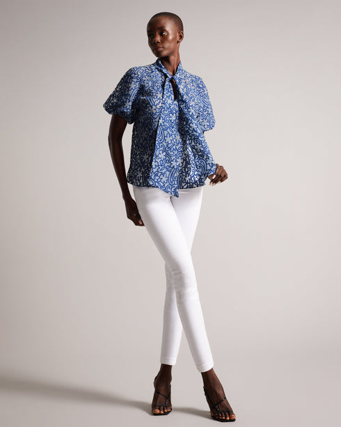 MELODIY-Tops-Add a touch of texture and colour to your outfit with the dreamy MELODIY top. Its paisley design is sure to stand out, while puff sleeves and a neck tie enhance the silhouette. Boxy fit top Semi sheer Jacquard paisley design Short puff sleeves Oversized neck tie High neck Awuoi is 5'10.5" / 1.79m and wears Bright Blue in a Ted size 1- Ted Baker Romania